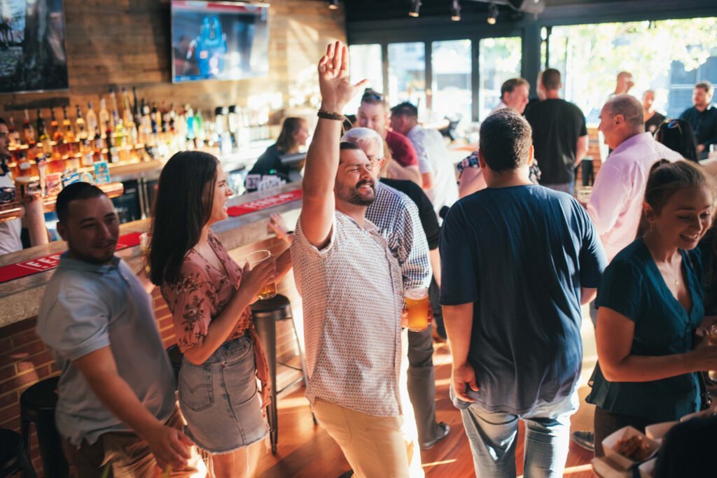 photo of a guy raising his hands